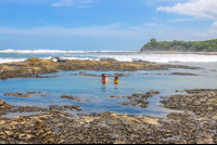 Playa Pelada Tide Pool Dad And Son Playing
 - Costa Rica