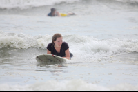 Lady Surfing In Nosara Playa Guiones
 - Costa Rica