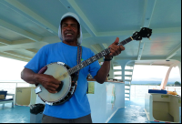 iguana catamaran tour thomas plays banjo 
 - Costa Rica