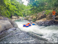 Sliding On Rock Surfaces Rio Negro Tubing Rincon De La Vieja
 - Costa Rica