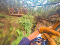 Riding Last Cable To Land Platform White River Canyon Zip Line Rincon De La Vieja
 - Costa Rica