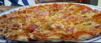 ham pizza closeup il peperoni
 - Costa Rica