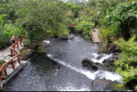 view from above tabacon cascading river 
 - Costa Rica