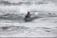 Man Paddling Looking For A Wave
 - Costa Rica