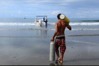 dominical surf dive snorkel carrying tanks 
 - Costa Rica