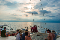 Sun Rays Reflected On The Ocean Surface Marlin Del Ray Catamaran
 - Costa Rica