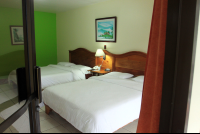 hotel lavas tacotal junior suite bed 
 - Costa Rica