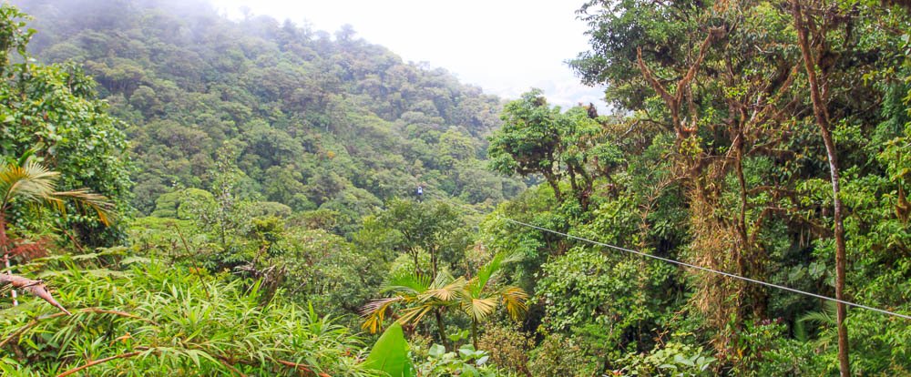 skytrek over a valley 
 - Costa Rica