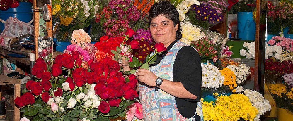 flower lady at central market in san jose
 - Costa Rica