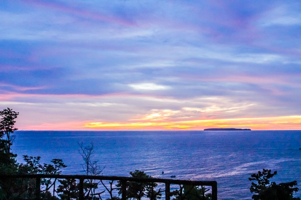 sunset with cano island view 
 - Costa Rica