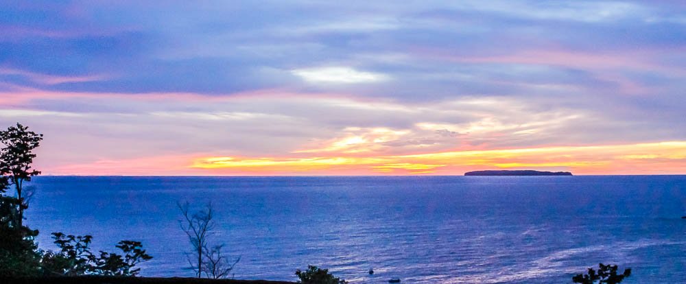 sunset with cano island view 
 - Costa Rica