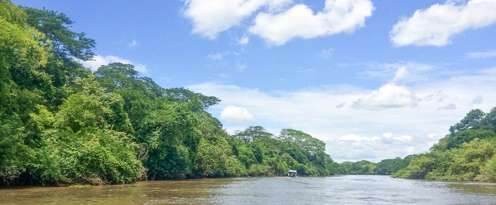 blue skies at tempisque river 
 - Costa Rica