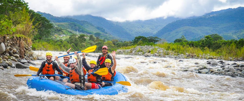 grande de orosi whitewater rafting rafting with mountain background
 - Costa Rica