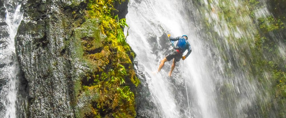 man rappelling horseback rapelling tour rancho tropical matapalo
 - Costa Rica