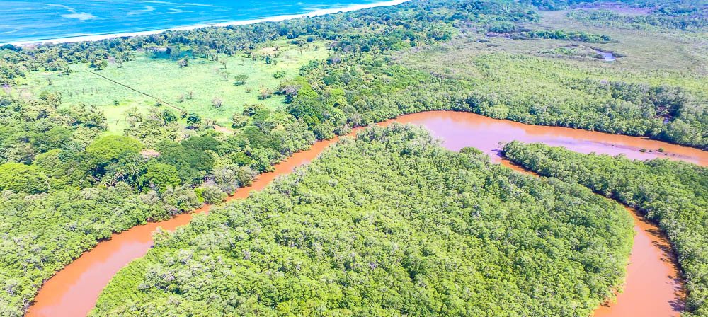 aerial view tamarindo estauary canal loop and playa grande front
 - Costa Rica