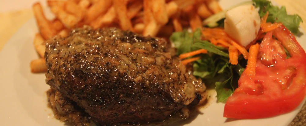 fire grilled steak with salad
 - Costa Rica