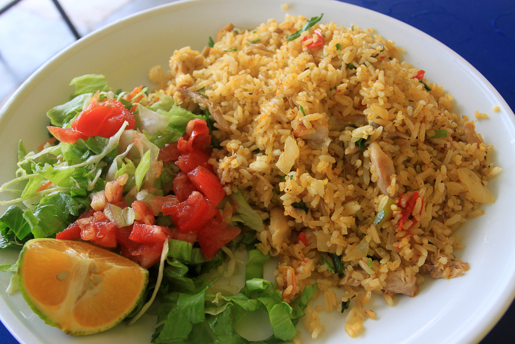 eating cheap arroz con pollo 
 - Costa Rica