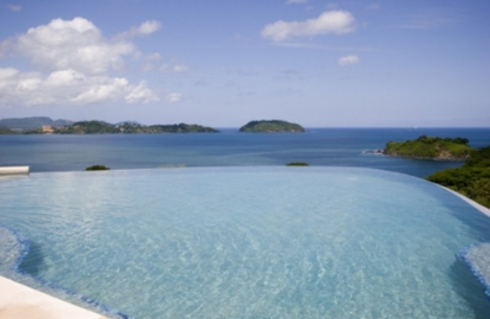 infinity pool ocean views
 - Costa Rica