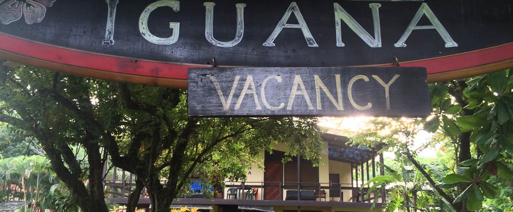 entrance sign gilded iguana
 - Costa Rica