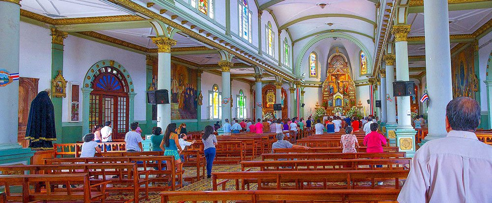 people attending mass at the alajuela church 
 - Costa Rica