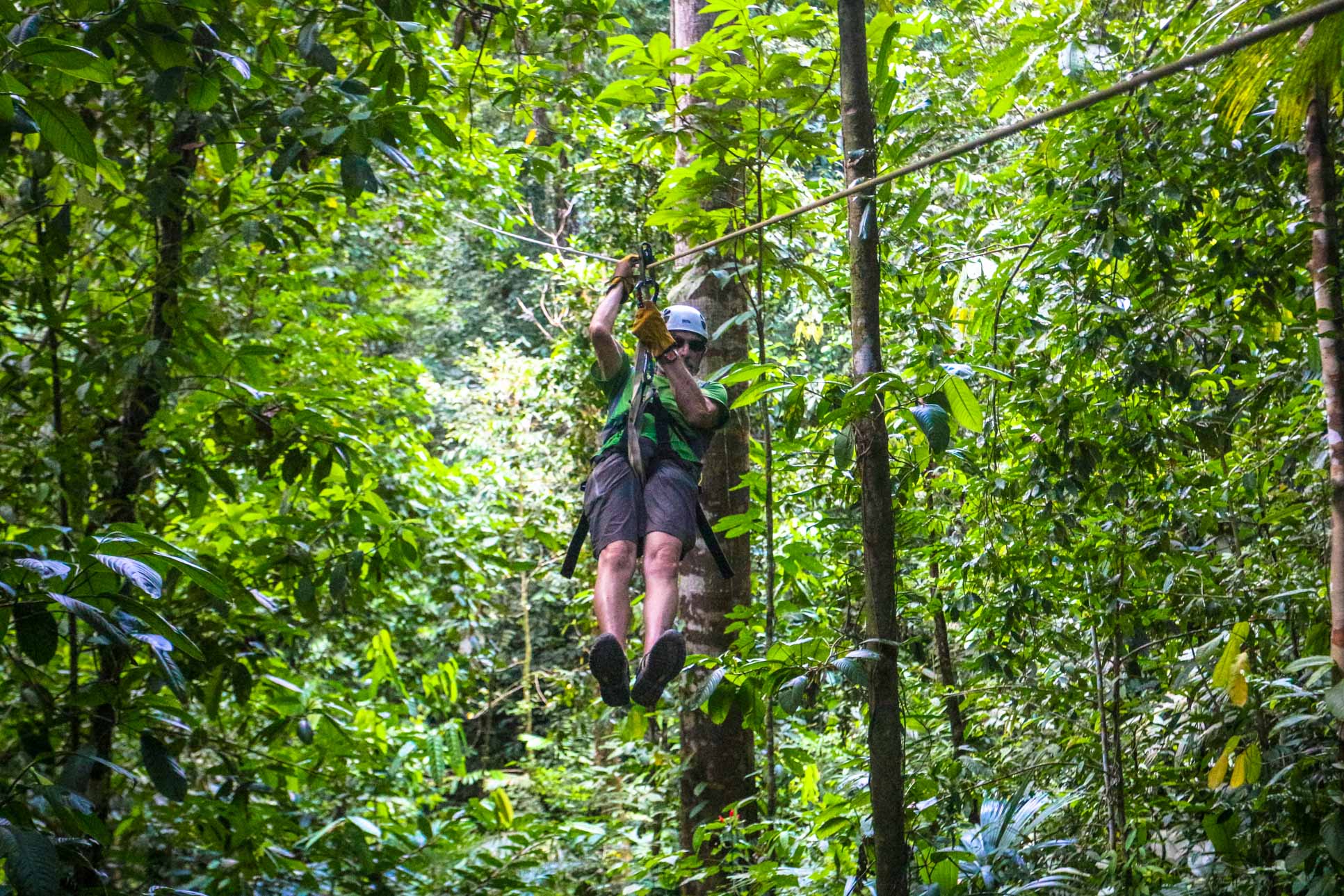 Man Zip Lining Osa Palmas Canopy Tour