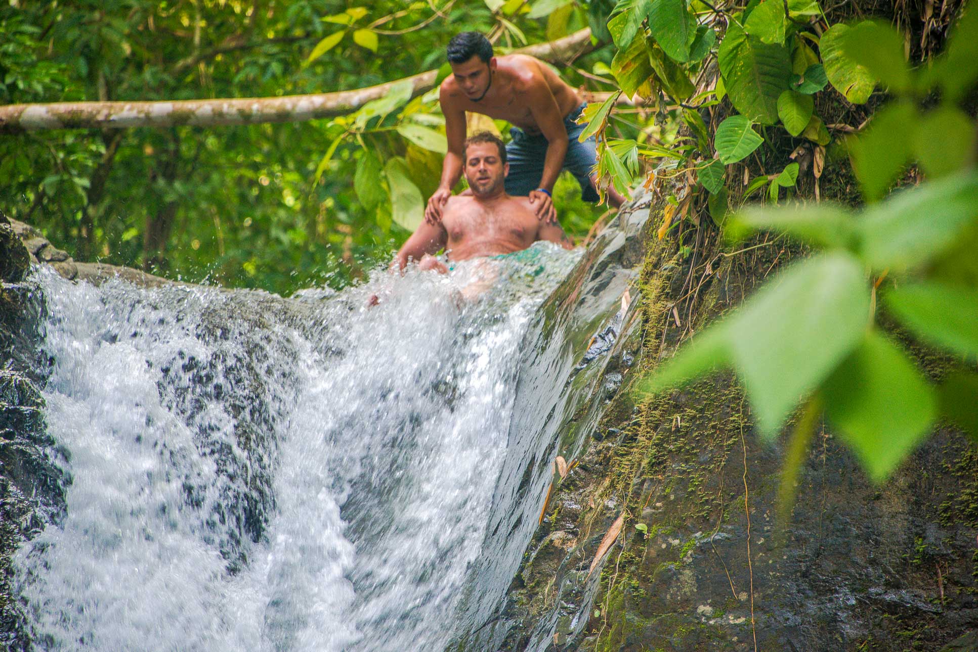 Man About To Slide On Uvita Waterfall Waterfall Tour Manuel Antonio