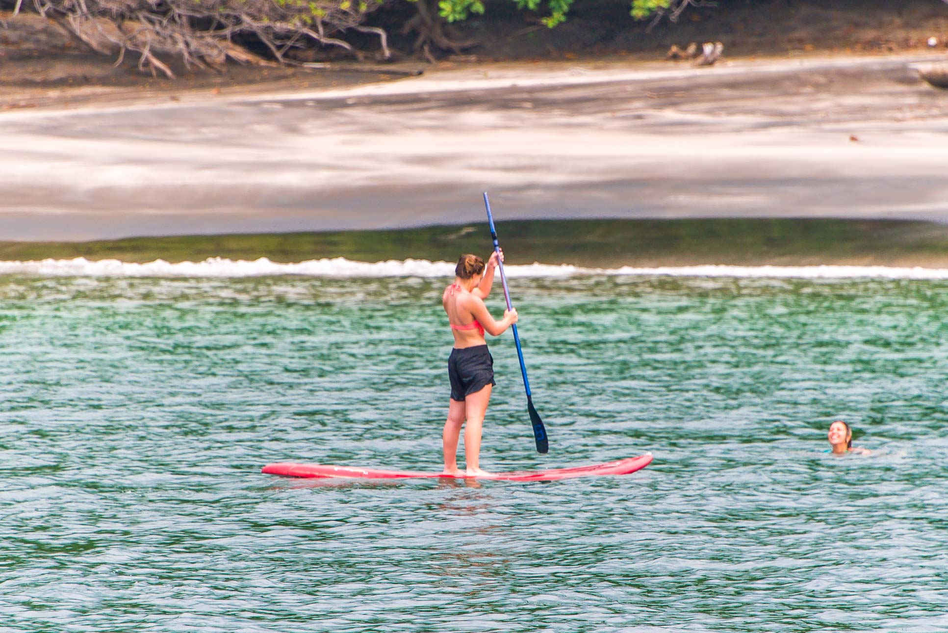 Lady Doing Stand Up Paddle In Playa Huevos Marlin Del Ray Catamaran