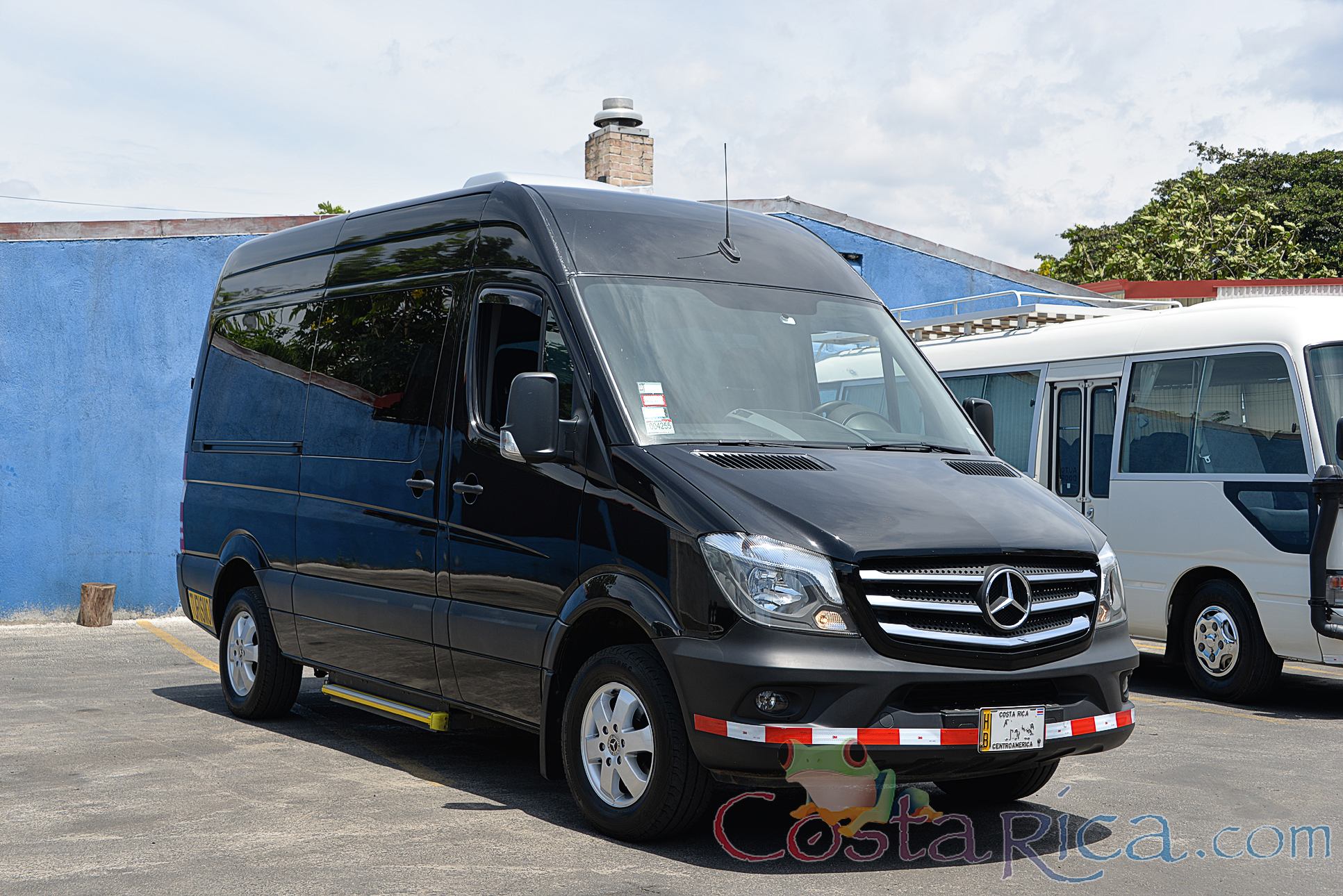Black Mercedes Benz Sprinter Van Lateral Passenger View