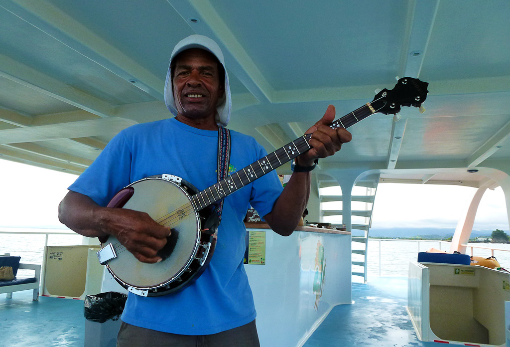 iguana catamaran tour thomas plays banjo 7.jpg