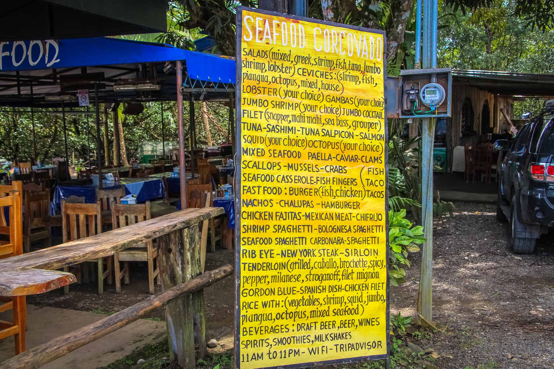 Marisqueria Corcovado Seafood Menu Sign