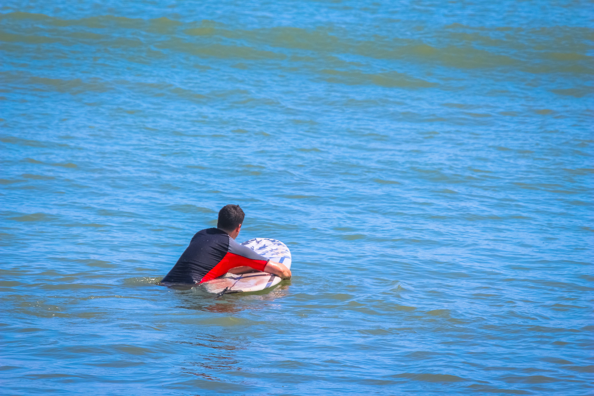 Mounting The Board On Playa Sombrero Pollo Surf School Matapalo