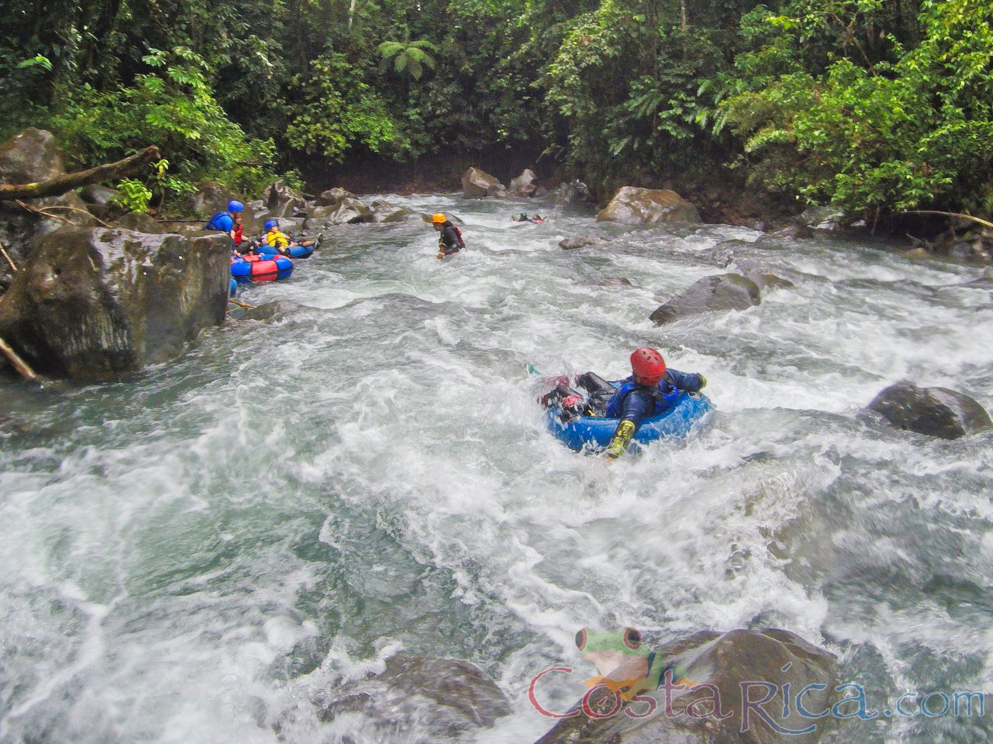 Guide Tubing Down The Currents Of Blue River To Join The Group Rincon De La Vieja