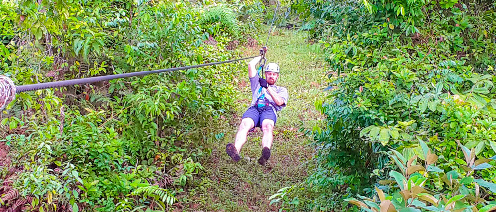 Man Zip Linning On Corcovado Canopy Tour