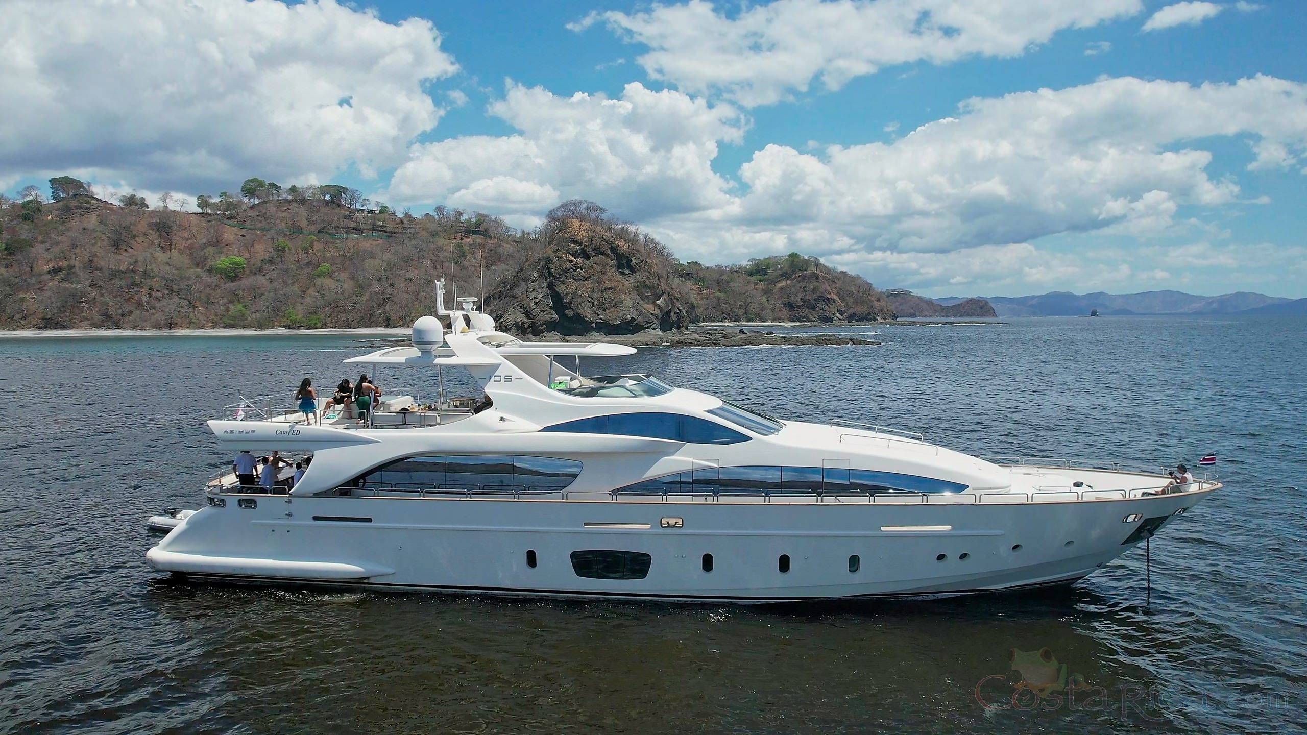 yacht azumit lateral aerial view on the ocean with mountain and sky view.jpg