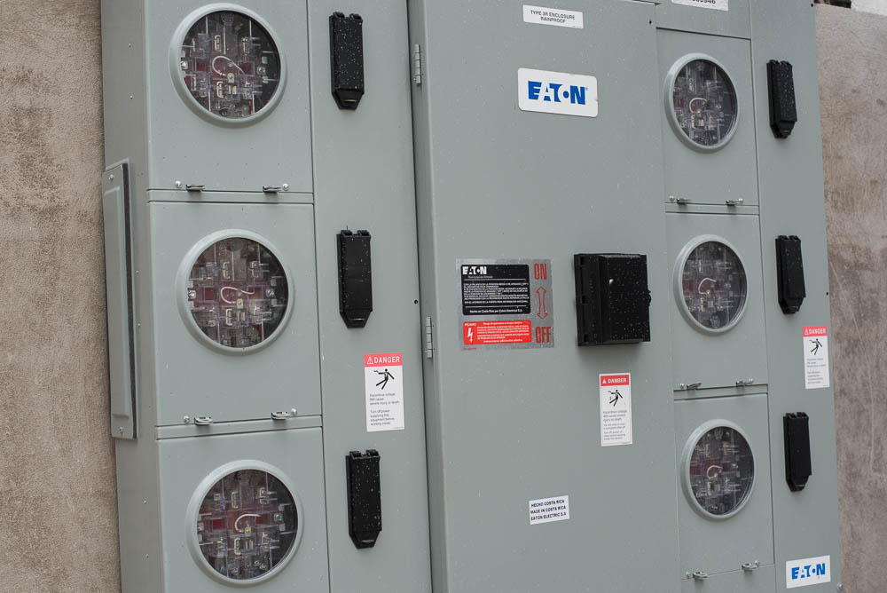 Utility Meters Located On The Side Of Building