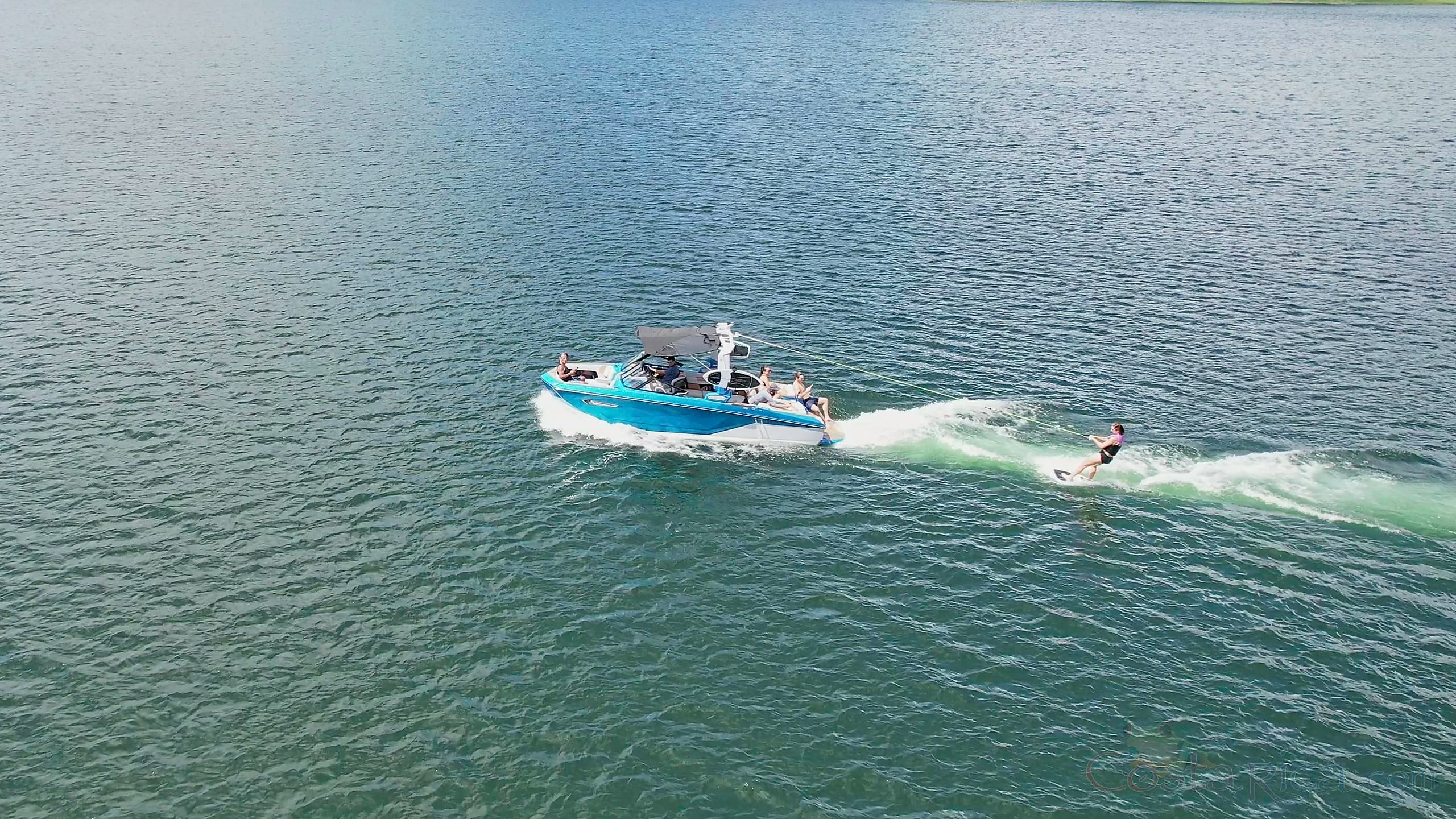 person being pulled on surf board by super air nautique g23 arenal.jpg