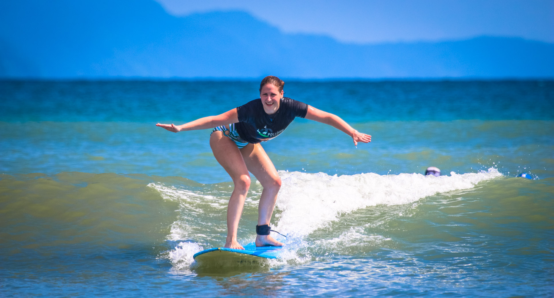 Lady Standing On Board Pollo Surf School Matapalo