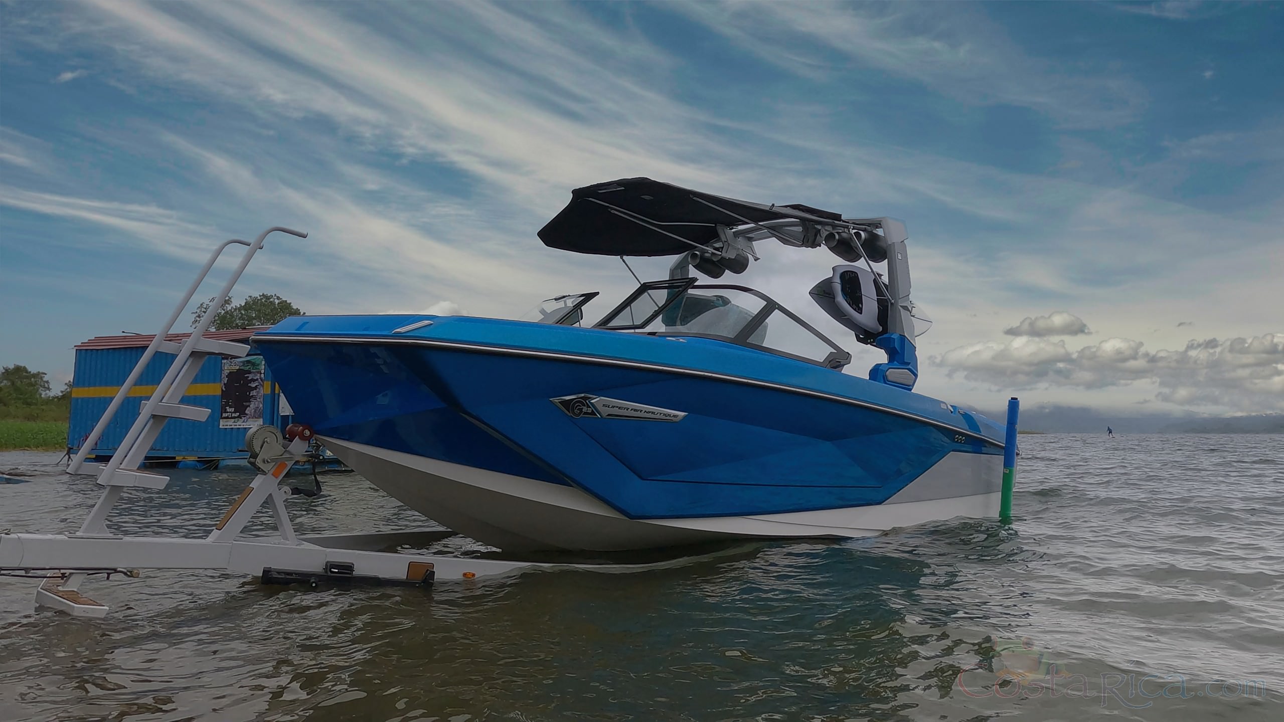 lateral view with blue skies super air nautique g23 arenal.jpg