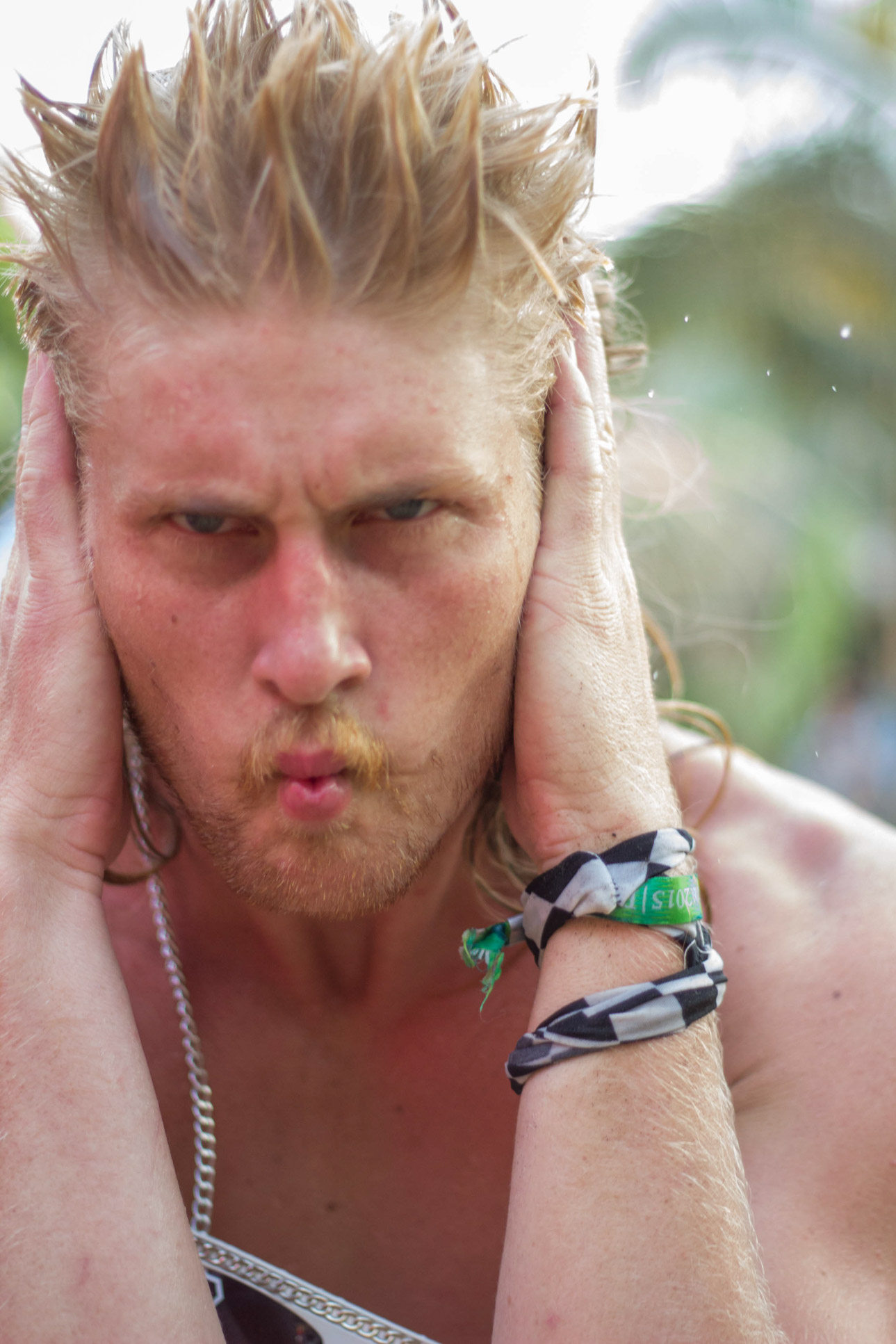 Man With His Hands On His Ears Envision Festival Costa Rica