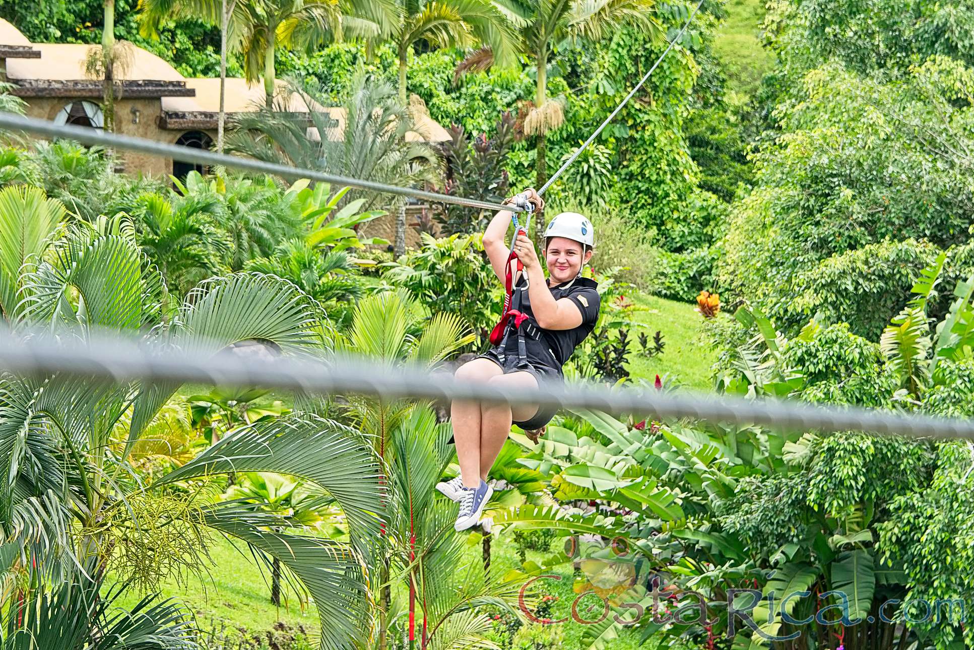 Flying Above The Resort Los Lagos On A Zip Line Los Canones Canopy Tour La Fortuna